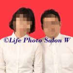 赤背景の中国結婚証用の証明写真撮影